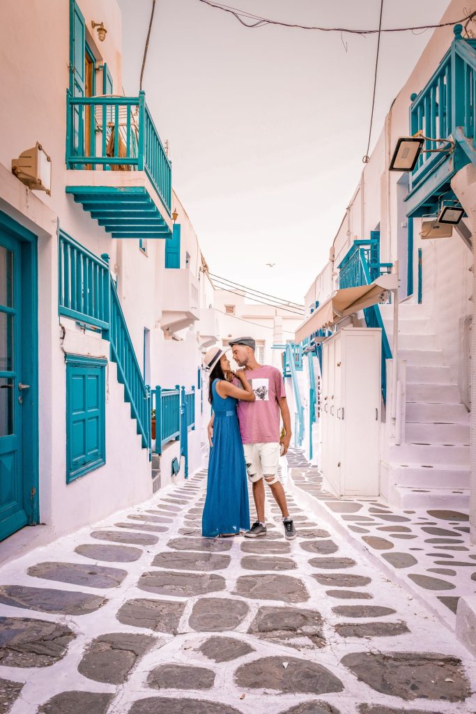 Mykonos,Greece,Colorful,Town,,Young,Romantic,Couple,In,Love