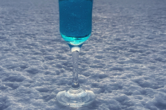 Bolivija - sončni zahod v Uyuniju z odsevom v vinu