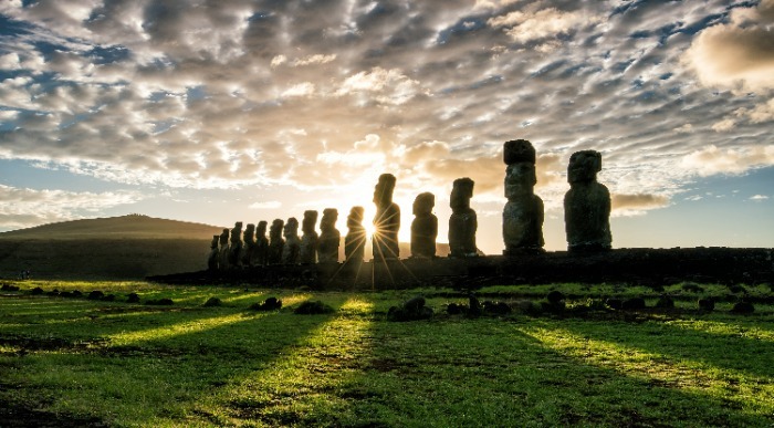 Silhouette shot of Moai statues in Easter Island, Chile sunrise_457523071